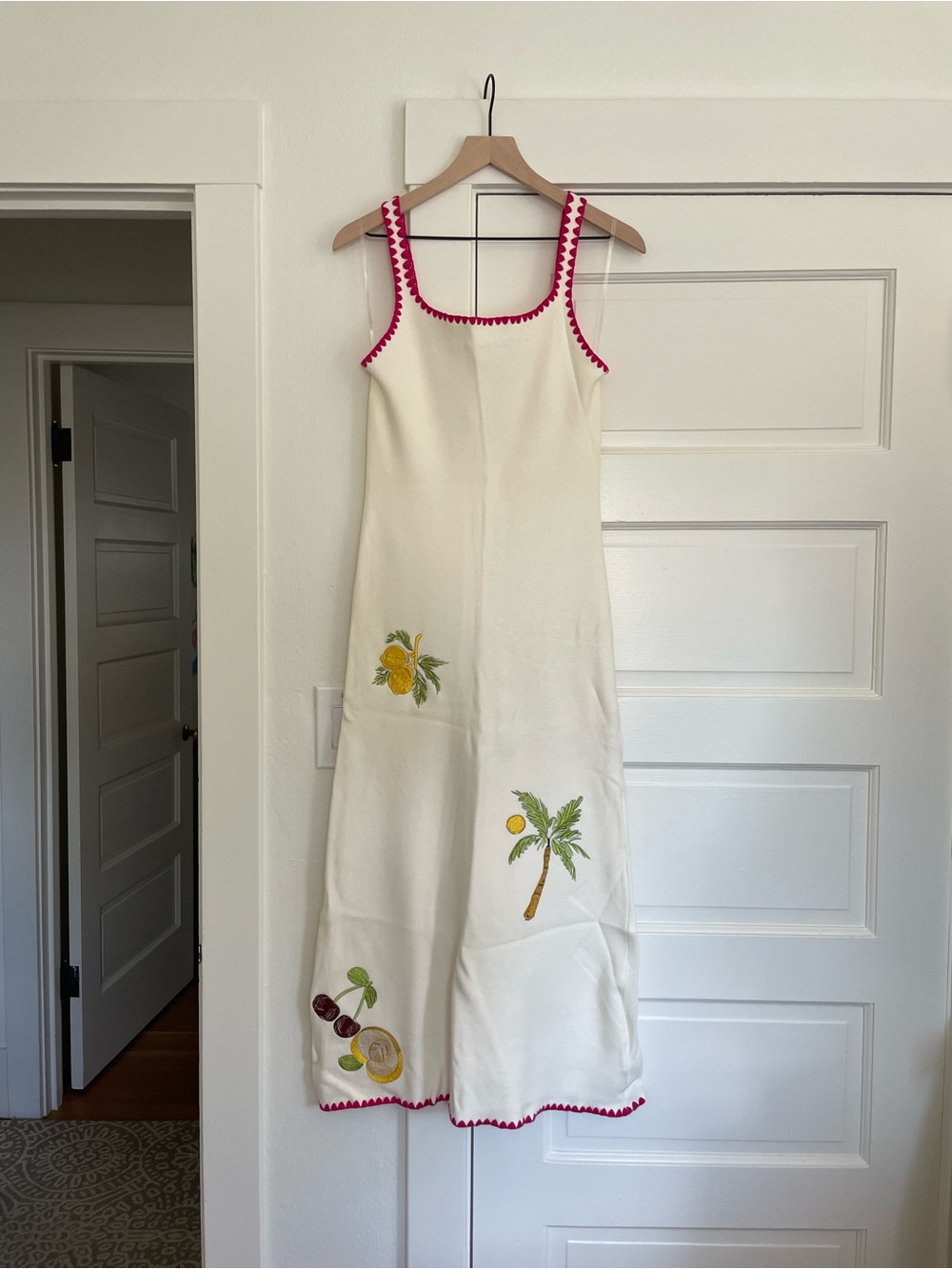 Able White Maxi Dress with Pink Trim and Tropical Embroidery just beautiful. 🩷